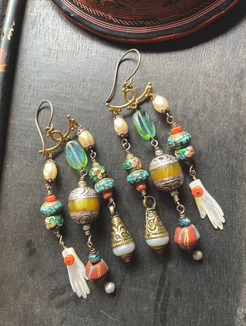 Hand and Shell earrings